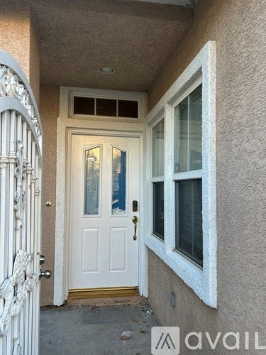 A kitchen with a table and chairs in the middle of the room.