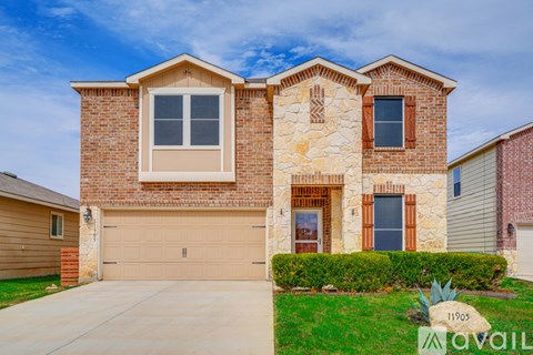 A house with a garage is for sale.