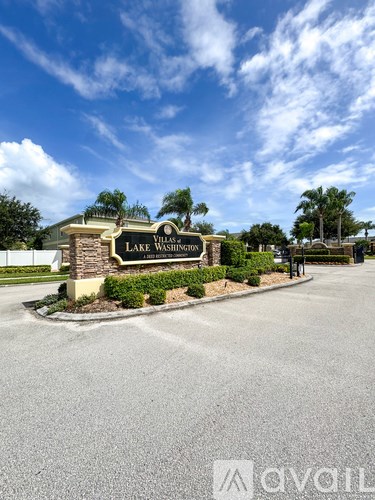The entrance to Lake Washington Villas is shown on a sunny day.