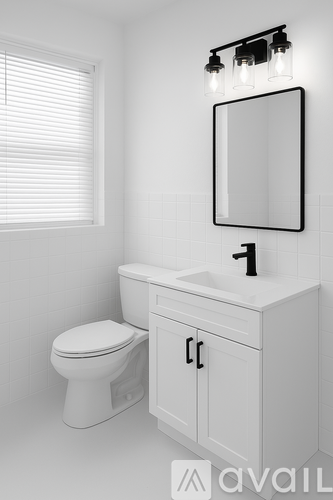 A white bathroom with a toilet, sink and mirror.