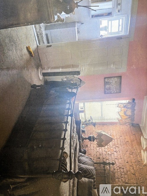 A room with a vintage vibe, featuring a vintage vacuum cleaner.