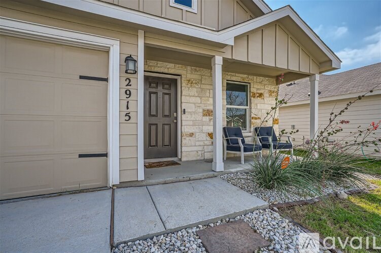 A house numbered 2913 is shown with a brown door and a small porch area.