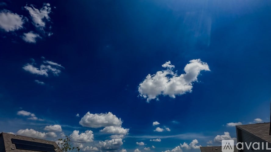 The sky is blue with a few clouds scattered across it.