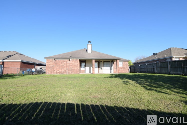 A house with a lawn in front of it is for sale.