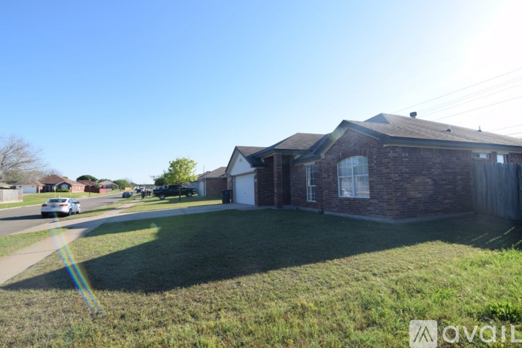 A house with a lawn in front of it is for sale.