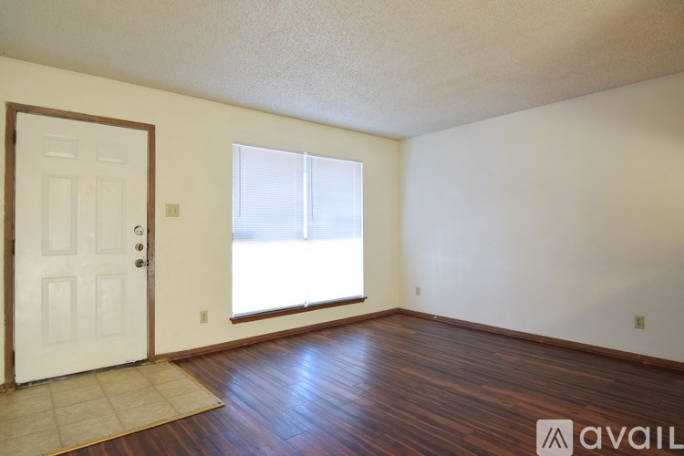 A small bathroom with a toilet, sink and bathtub.