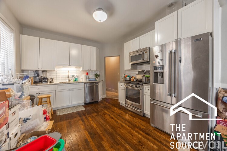 Apartment source logo on a kitchen.