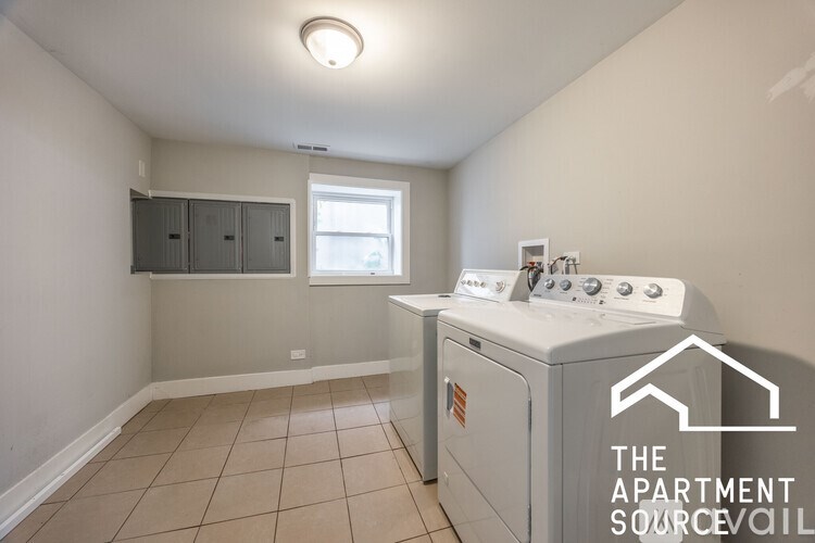 A small room with a washer and dryer.