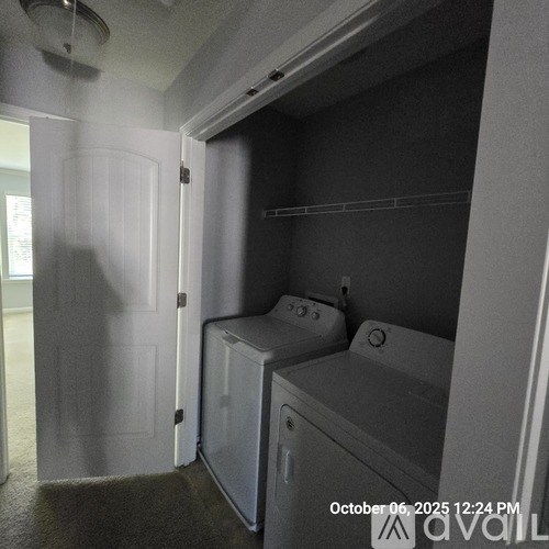A laundry room with a washer and dryer.