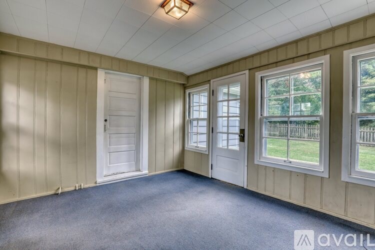 A kitchen sink with a chrome finish and two faucets.