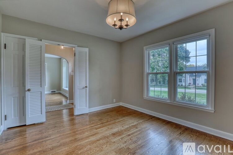 A staircase with a white riser and dark treads.