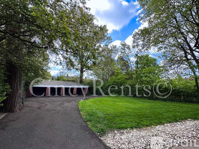 A pathway leads to a sign that says "City Rents".