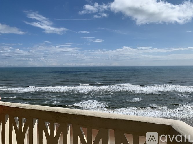 A view of the ocean from a balcony.