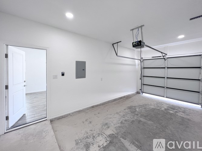 A room with a basketball hoop mounted on the wall.
