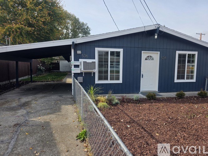 A blue house with the number 536 on it.