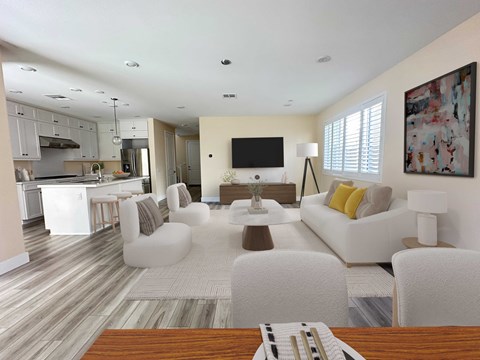 A modern living room with a white couch and a wooden coffee table.