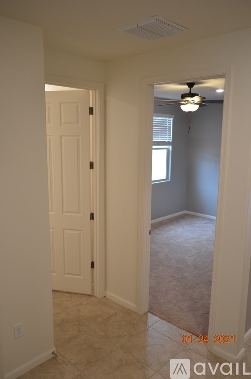 A room with a door and a window.