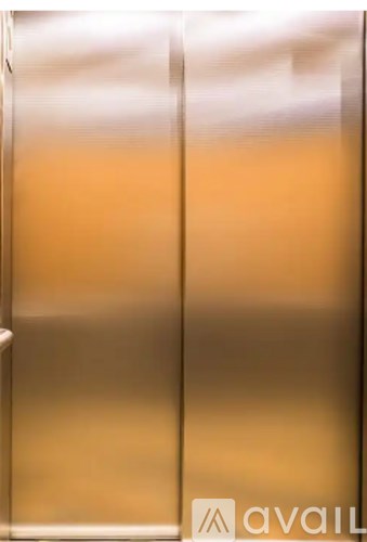 A glass door with a metal frame.