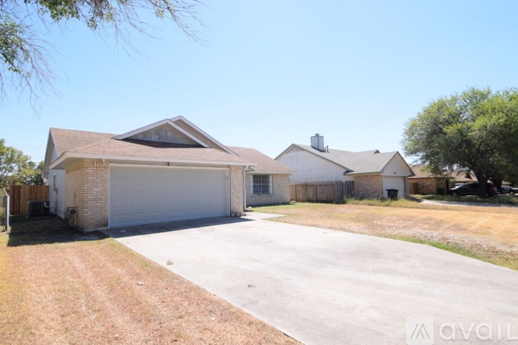 A house with a garage is available for sale.