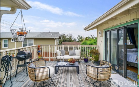 A patio with a table and chairs is shown.