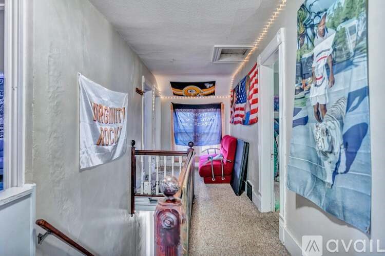 A hallway with a banner that says "VIRGINIA" on the left side.
