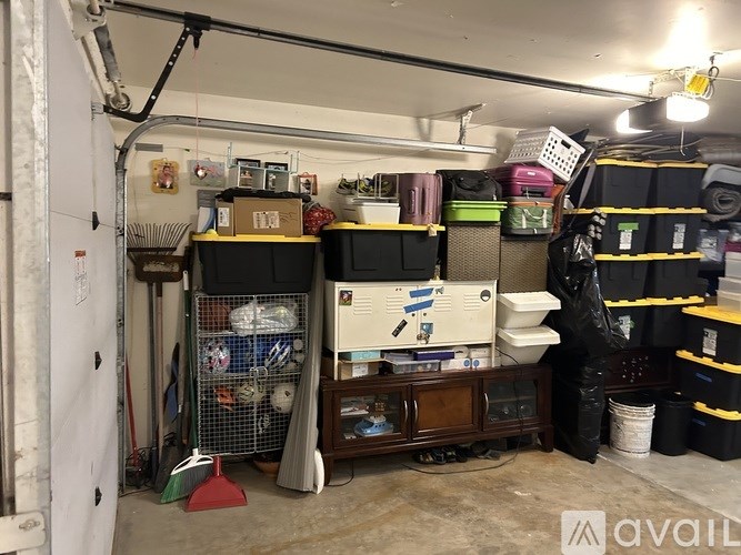 A storage room with various items and containers.