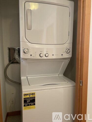 A white oven with a sticker on it that says Energy Guide.