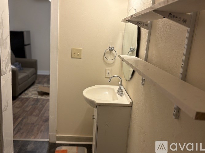 A toilet with a red and white tape around it.