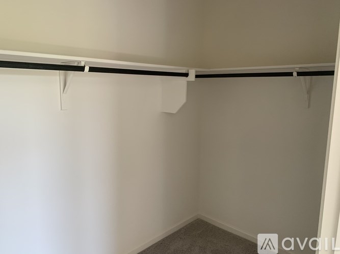 A white wall with a black line on it.