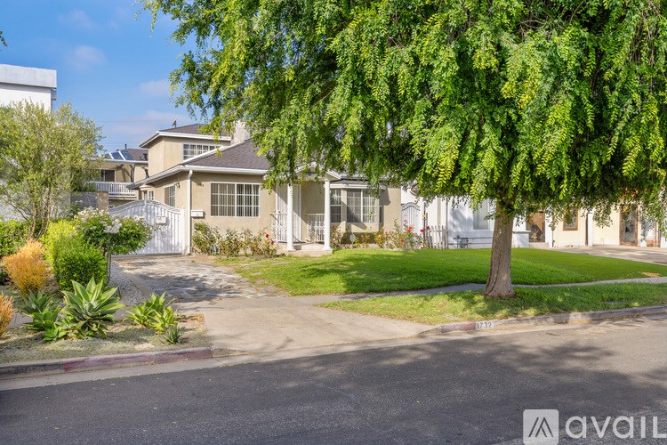 A residential area with houses and greenery.