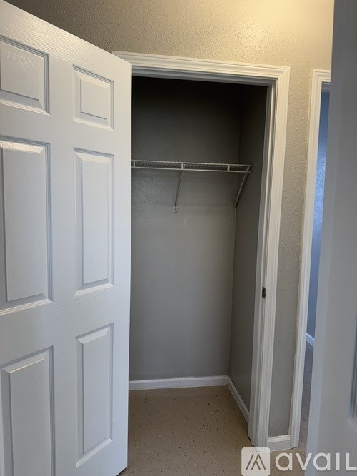 A white door with a small white interior.