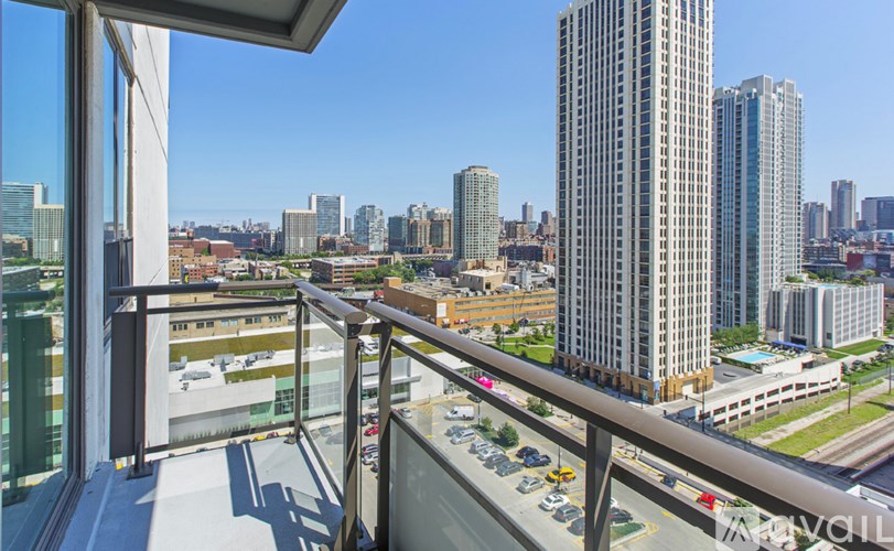 A view from a high-rise building looking out over a cityscape.