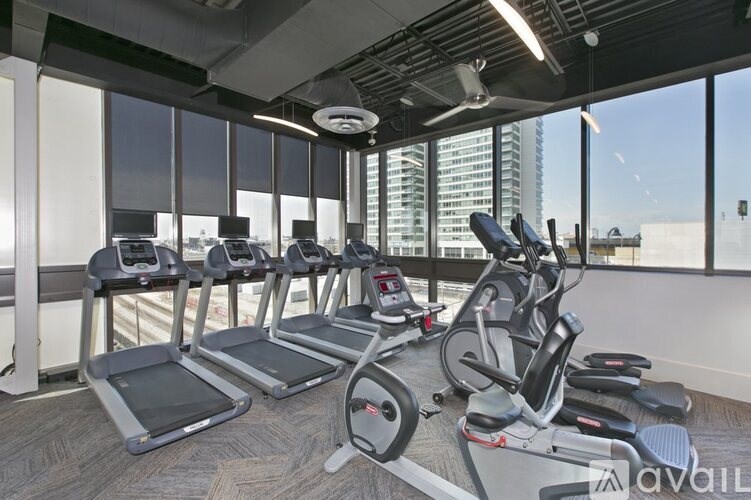 A gym with treadmills and exercise bikes is available for use.