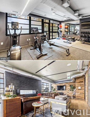 A modern home gym with a treadmill, exercise bike, and other equipment.