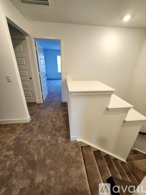 A room with a staircase leading to the second floor.