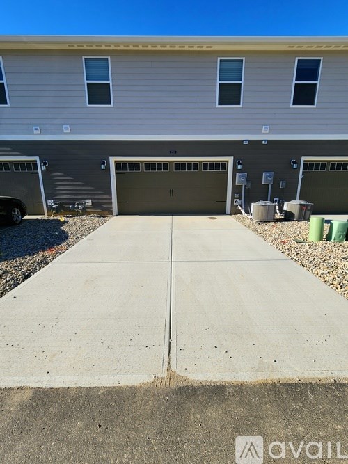 A building with a garage door in front.