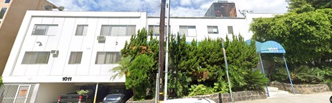 A white building with the number 1011 on it.