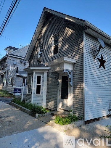A house with a star decoration on the wall.