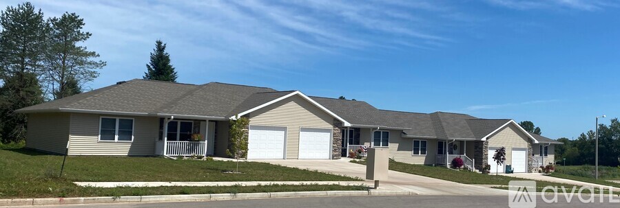 A row of houses with the Avant logo in the foreground.