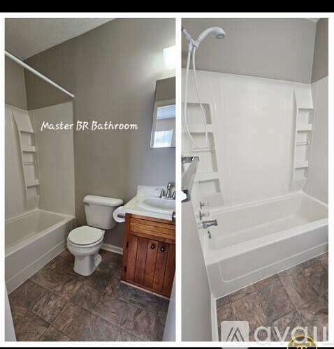 A bathroom with a toilet, sink, and bathtub.