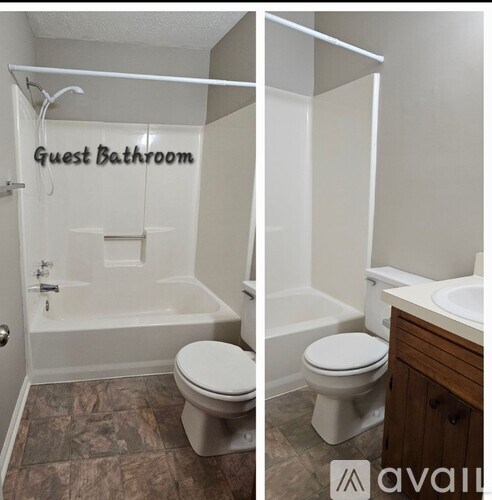 A guest bathroom with a toilet, sink, and bathtub.