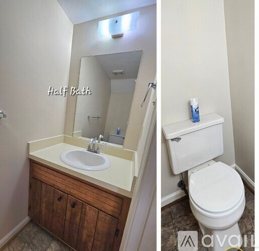 A bathroom with a sink and toilet.
