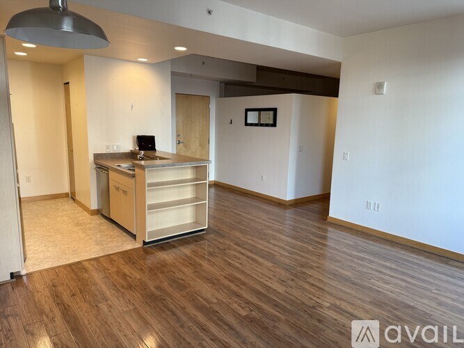 A room with a desk and a computer on it.