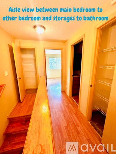 Aisle view between main bedroom to other bedroom and storages to bathroom.