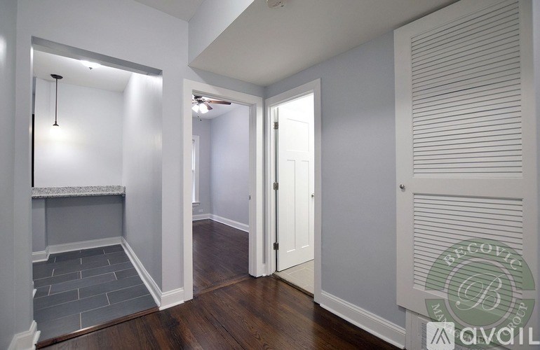 A room with a fireplace and a sliding door.