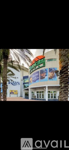 A building with a sign that says "Avail" on it.