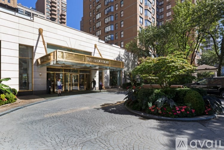 A street view of a building with the name "Winter Court" on it.