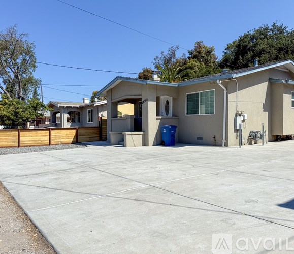 A house with a driveway in front of it.