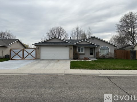 A house with a garage is available for sale.