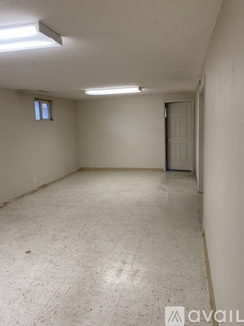 A room with a door and a window.